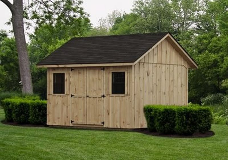 12x16 Manor Shed,  Rustic Cedar Stain, Green trim, Weatherwood roof, Gable vents, Custom doors